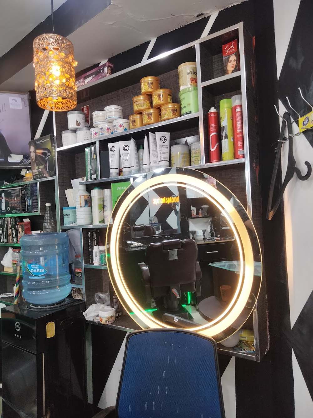 A barber station with mirror and products